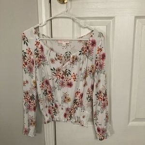 Cute white flower shirt nothing wrong with it Only been worn one time